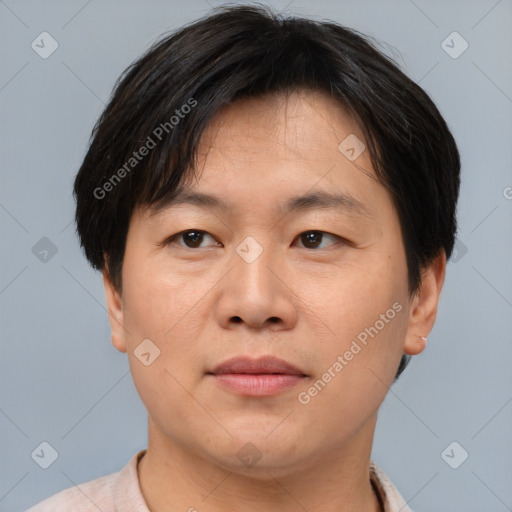 Neutral asian adult male with short  brown hair and brown eyes