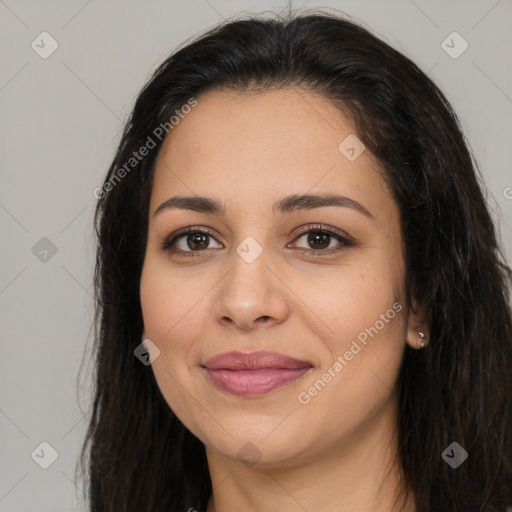 Joyful latino young-adult female with long  brown hair and brown eyes