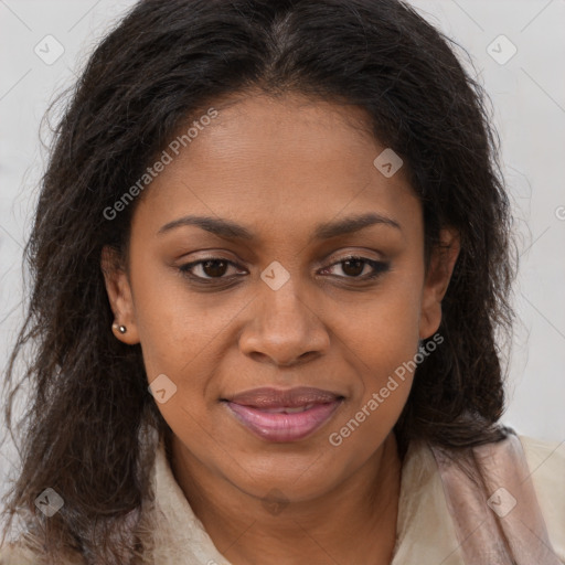 Joyful black young-adult female with long  brown hair and brown eyes