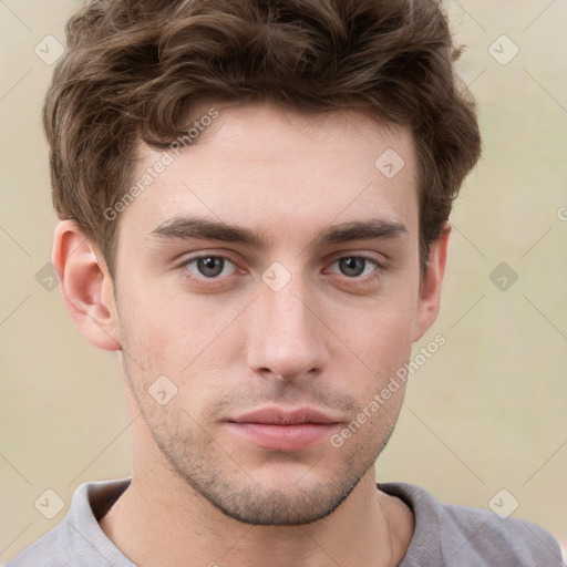 Neutral white young-adult male with short  brown hair and grey eyes