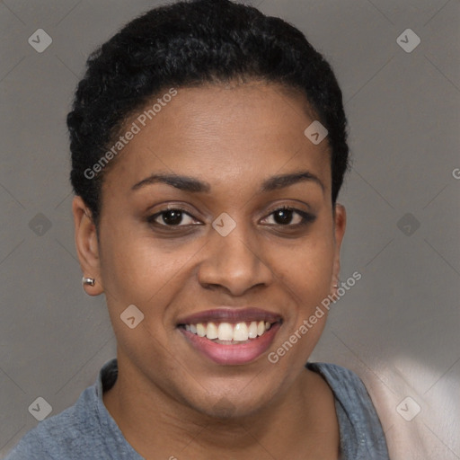 Joyful black young-adult female with short  brown hair and brown eyes