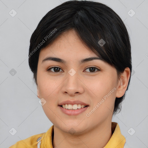 Joyful asian young-adult female with medium  black hair and brown eyes