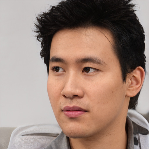Neutral asian young-adult male with short  black hair and brown eyes