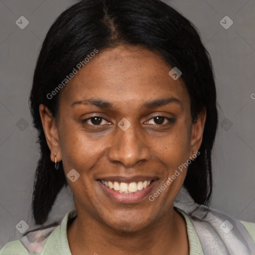 Joyful black young-adult female with medium  brown hair and brown eyes