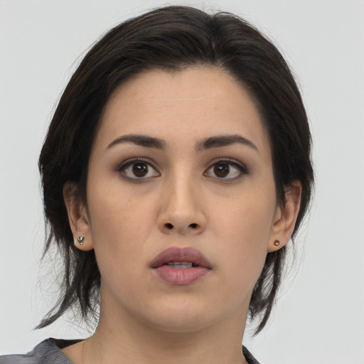 Neutral asian young-adult female with medium  brown hair and brown eyes