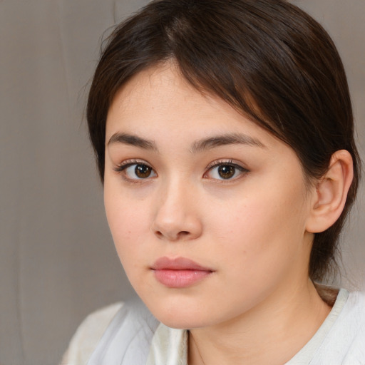 Neutral white young-adult female with medium  brown hair and brown eyes