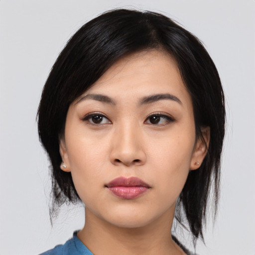 Neutral asian young-adult female with medium  black hair and brown eyes