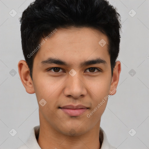 Joyful asian young-adult male with short  black hair and brown eyes