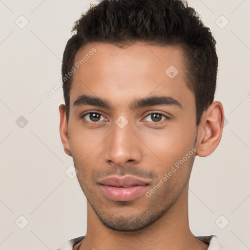 Neutral latino young-adult male with short  brown hair and brown eyes