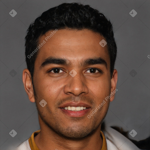 Joyful latino young-adult male with short  black hair and brown eyes