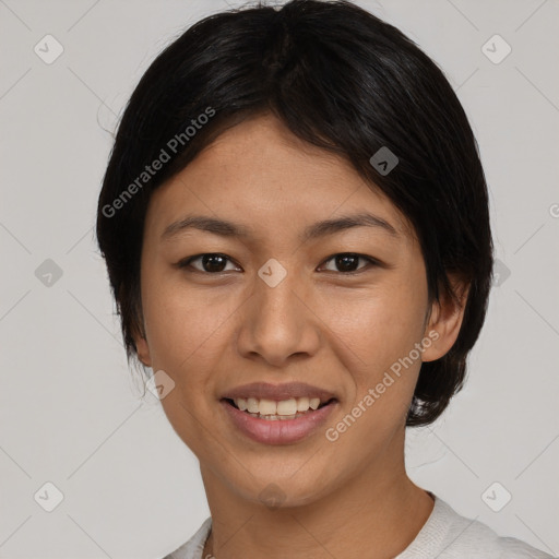 Joyful asian young-adult female with medium  black hair and brown eyes