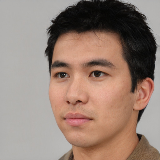 Neutral asian young-adult male with short  black hair and brown eyes
