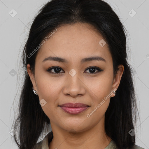 Joyful asian young-adult female with long  brown hair and brown eyes