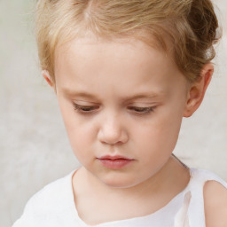 Neutral white child female with short  brown hair and brown eyes