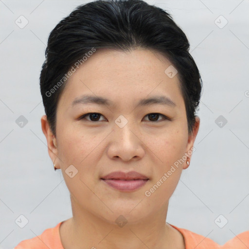 Joyful asian young-adult female with short  brown hair and brown eyes