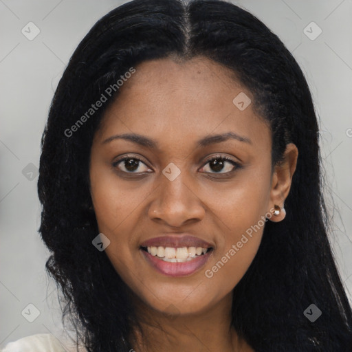 Joyful latino young-adult female with long  black hair and brown eyes