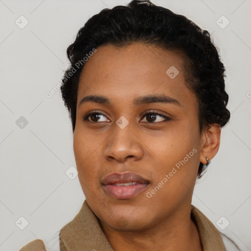 Joyful black young-adult female with short  black hair and brown eyes