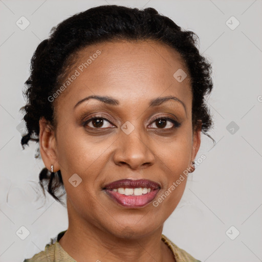 Joyful latino adult female with medium  brown hair and brown eyes