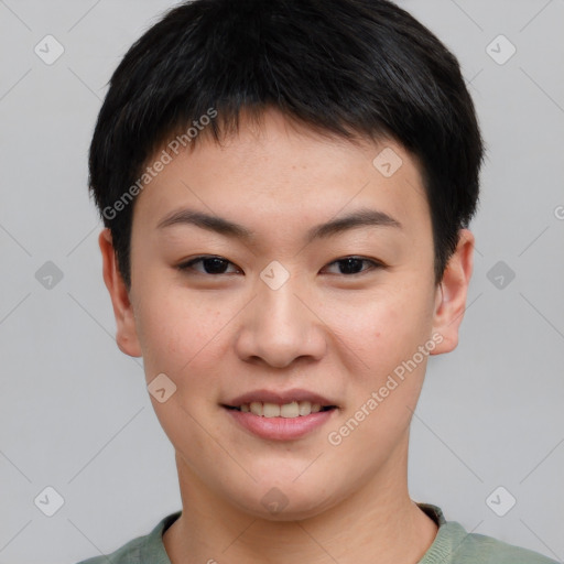 Joyful asian young-adult female with short  brown hair and brown eyes