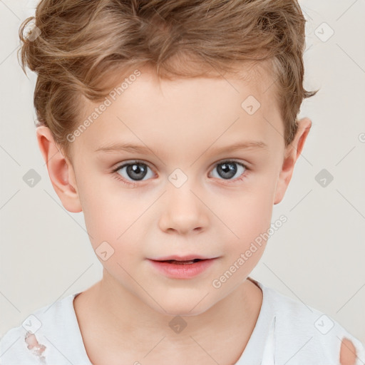 Joyful white child male with short  brown hair and brown eyes