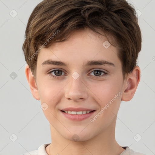 Joyful white child male with short  brown hair and brown eyes