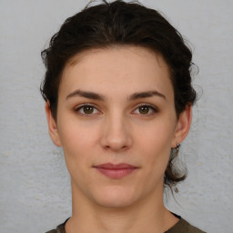 Neutral white young-adult female with short  brown hair and brown eyes