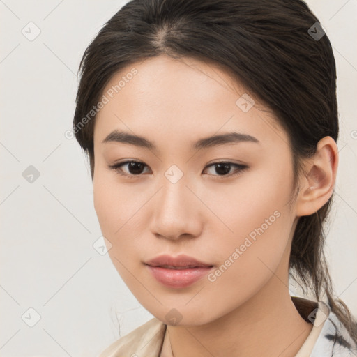 Neutral asian young-adult female with medium  brown hair and brown eyes