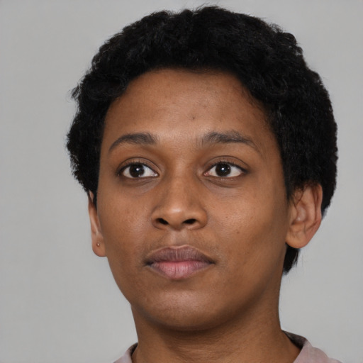 Neutral black young-adult female with short  black hair and brown eyes