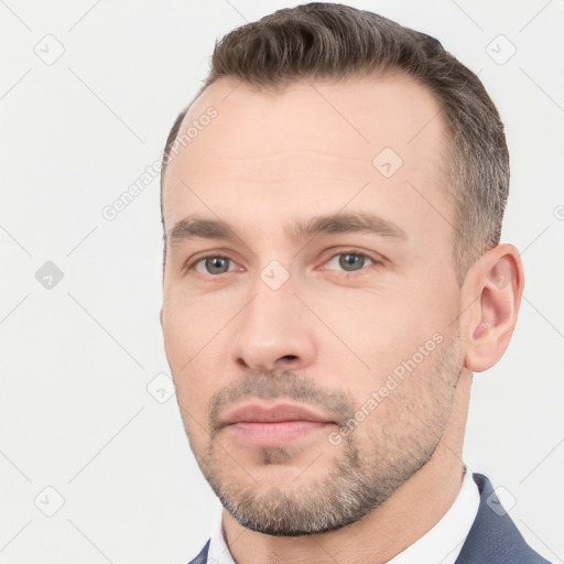 Neutral white young-adult male with short  brown hair and brown eyes