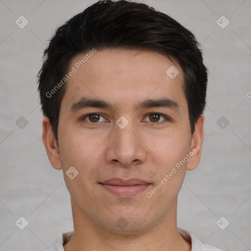 Joyful white young-adult male with short  black hair and brown eyes