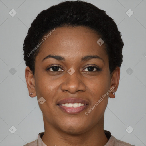 Joyful black young-adult female with short  brown hair and brown eyes