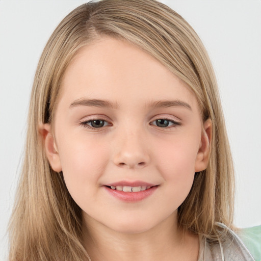 Joyful white child female with long  brown hair and brown eyes