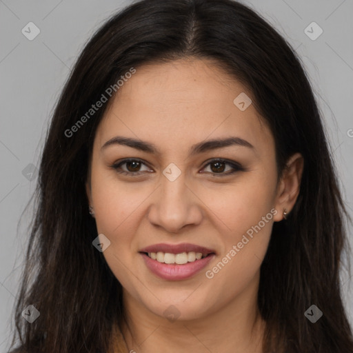 Joyful latino young-adult female with long  brown hair and brown eyes