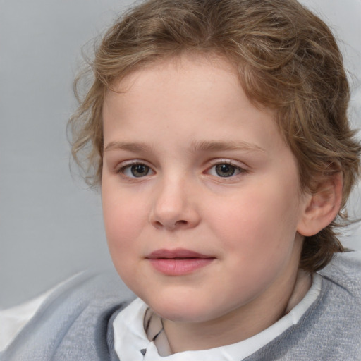 Joyful white child female with medium  brown hair and blue eyes