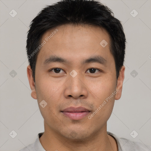 Neutral asian young-adult male with short  brown hair and brown eyes