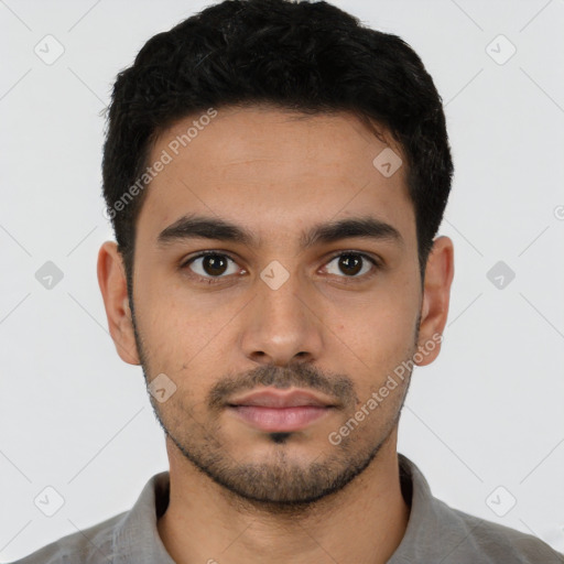 Neutral latino young-adult male with short  black hair and brown eyes