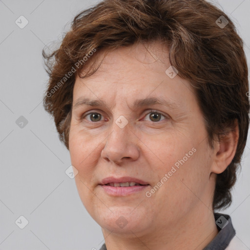 Joyful white adult female with short  brown hair and brown eyes