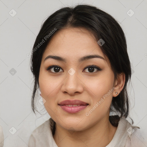 Joyful asian young-adult female with medium  brown hair and brown eyes