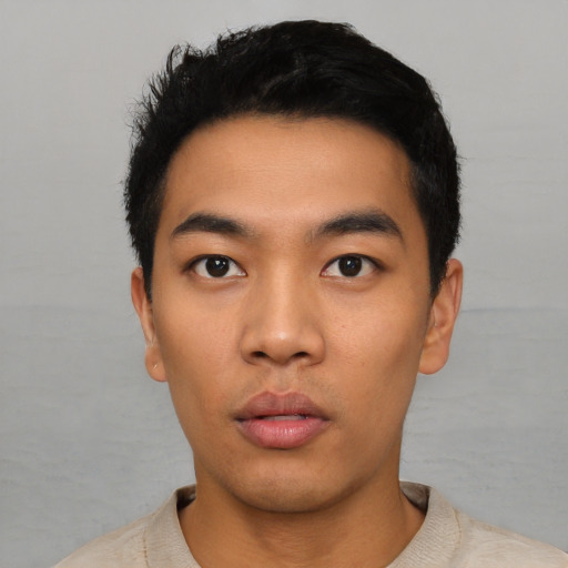 Neutral asian young-adult male with short  black hair and brown eyes