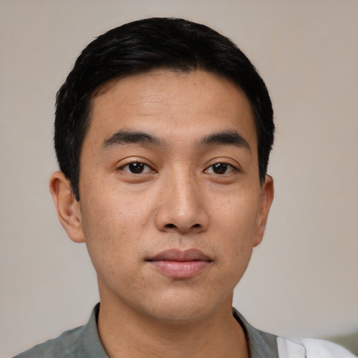 Neutral asian young-adult male with short  black hair and brown eyes