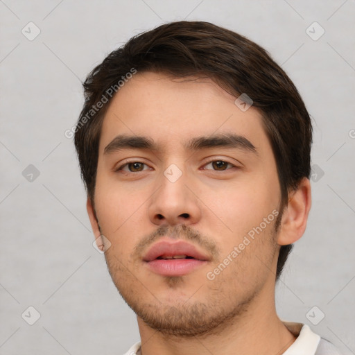 Neutral white young-adult male with short  brown hair and brown eyes