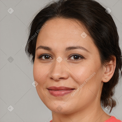 Joyful white adult female with medium  brown hair and brown eyes