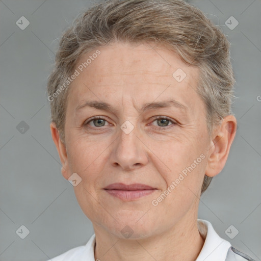 Joyful white middle-aged female with short  brown hair and brown eyes