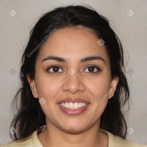 Joyful latino young-adult female with medium  brown hair and brown eyes