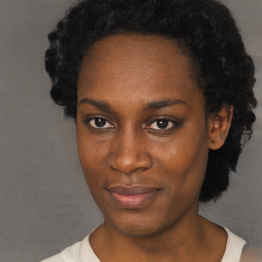 Neutral black young-adult female with short  black hair and brown eyes