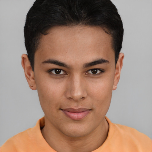 Joyful latino young-adult female with short  brown hair and brown eyes