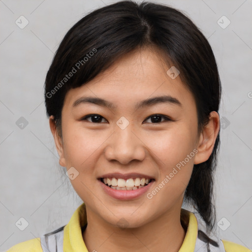 Joyful asian young-adult female with medium  brown hair and brown eyes