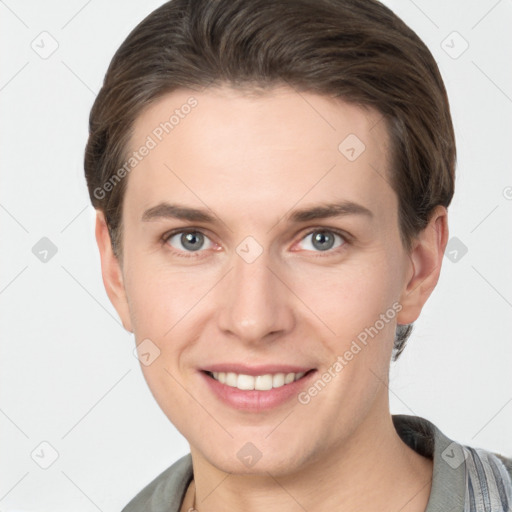 Joyful white young-adult female with short  brown hair and grey eyes