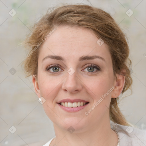 Joyful white young-adult female with medium  brown hair and green eyes