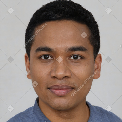 Joyful black young-adult male with short  black hair and brown eyes